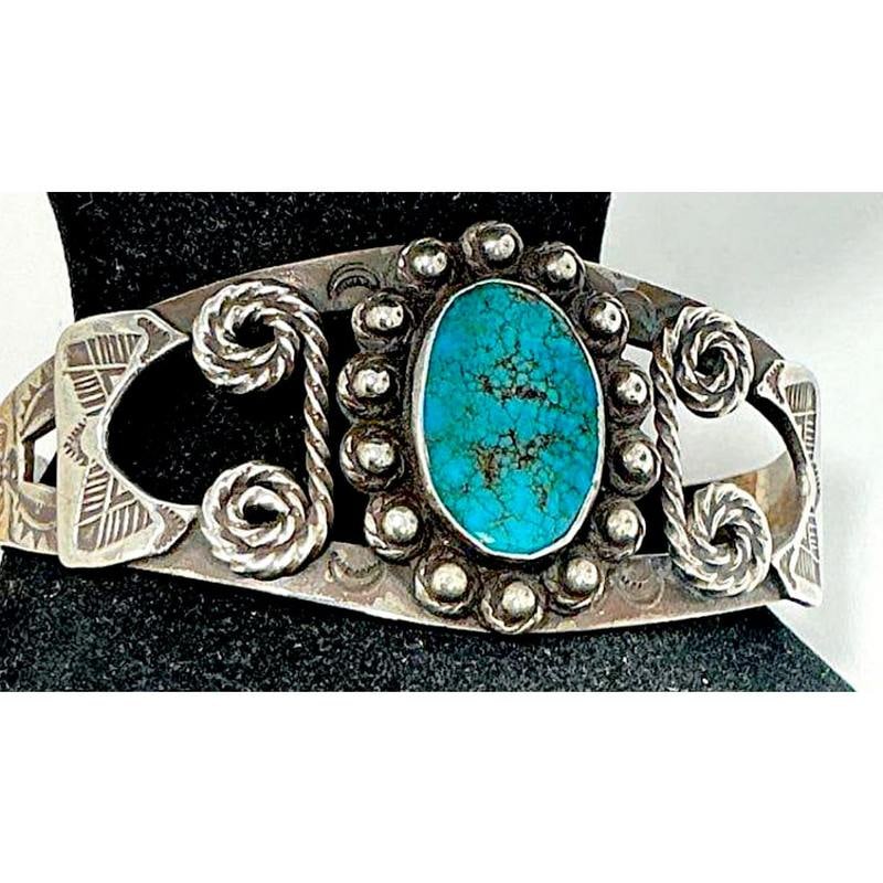 Vintage Navajo Turquoise Thunderbird Bracelet Navajo Ingot Sterling Silver: For your consideration is this stunning example of vintage, collectible Native American Art. This fine, vintage bracelet features an intricate hand-stamped tribal design on the front, with thunderbird