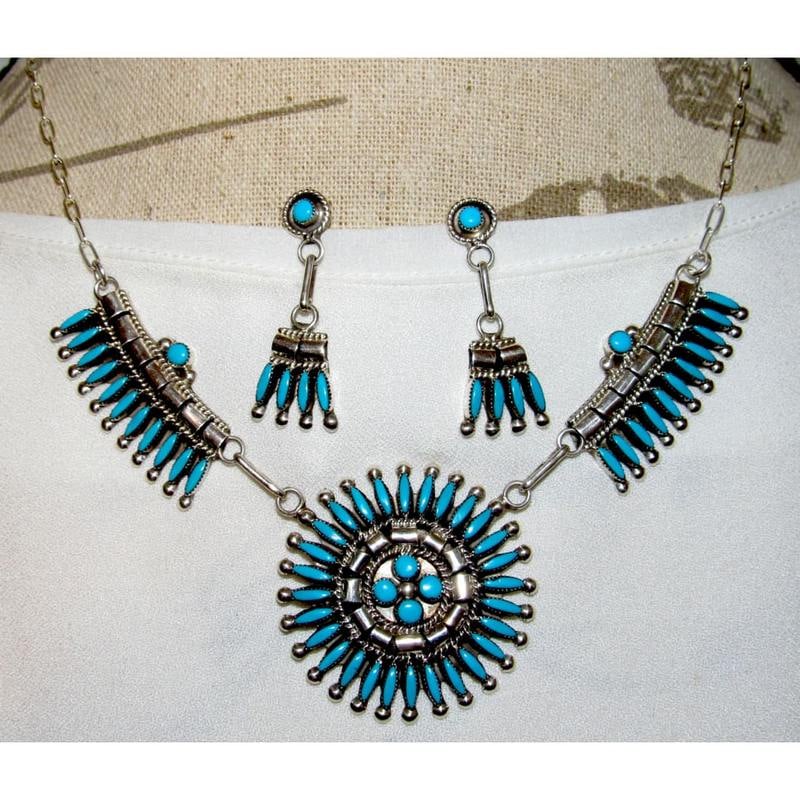 Zuni Turquoise Cluster Necklace and Earrings Set Sterling Silver: This stunning Zuni sterling silver turquoise necklace and earrings set features Sleeping Beauty Mine turquoise in a traditional petit point and snake eye cluster design. The 20-inch necklace is paired