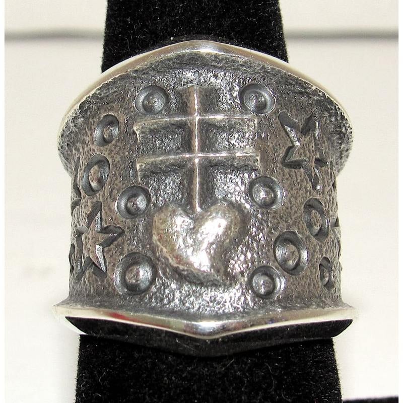 Navajo Kevin Yazzie Pueblo Cross Ring Size 8 Sand Cast Tufa Cast Sterling Silver: Stunning, exceptional quality Navajo sterling silver dragonfly pueblo cross tufa cast ring by the highly collectible, award winning Navajo artist Kevin Yazzie. The ring is size 8. Stamped sterling and