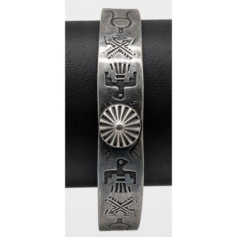 Vintage Fred Harvey Era Navajo Sterling Silver Thunderbird Cuff Bracelet: Vintage Fred Harvey Era Navajo Sterling Silver Thunderbird Cuff Bracelet. A striking vintage Fred Harvey era Navajo sterling silver cuff bracelet, dating approximately to the 1940s-1950s and showcasin