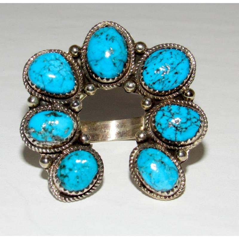 Navajo Naja Ring Size 7 Kingman Turquoise Statement Ring Native Signed: For your consideration is this stunning Navajo sterling silver, Kingman turquoise squash blossom naja design ring in size 7. Measures about 1.5" by 1.5" on the front. Signed by the artist, stamped ste