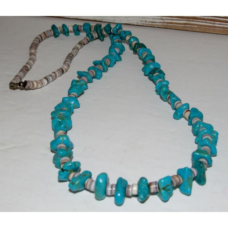 Vintage Navajo Turquoise Shell Heishi Bead Necklace: Phenomenal vintage Native American Navajo Kingman turquoise & shell statement heishi nugget bead necklace* Stone: Turquoise nugget, shell* Length : 24"* Bead Size: varies, graduated design* Color: Blu