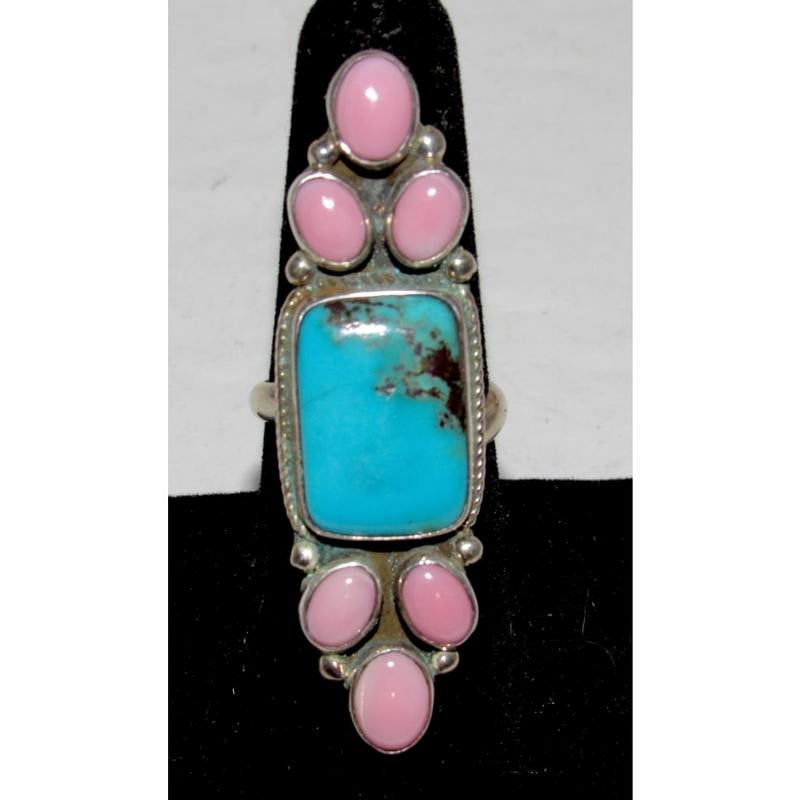 Navajo Turquoise Pink Conch Cluster Ring Adjustable Size 7.5 Sterling M. James: Introducing the exquisite Navajo Sterling Silver, Turquoise, and Pink Conch Shell Cluster Ring by the wonderful Navajo artist Marcella James. This breathtaking piece showcases a stunning arrangement o