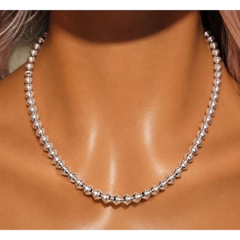 Handmade Navajo Pearls Necklace Sterling Silver 6mm Saucer Beads 18"L G Benally: Handmade Navajo Pearls Necklace Sterling Silver 6mm Saucer Beads Necklace 18"L G. Benally. Classic handmade Navajo pearls necklace with 6mm sterling silver saucer beads design by the Navajo artist Ger
