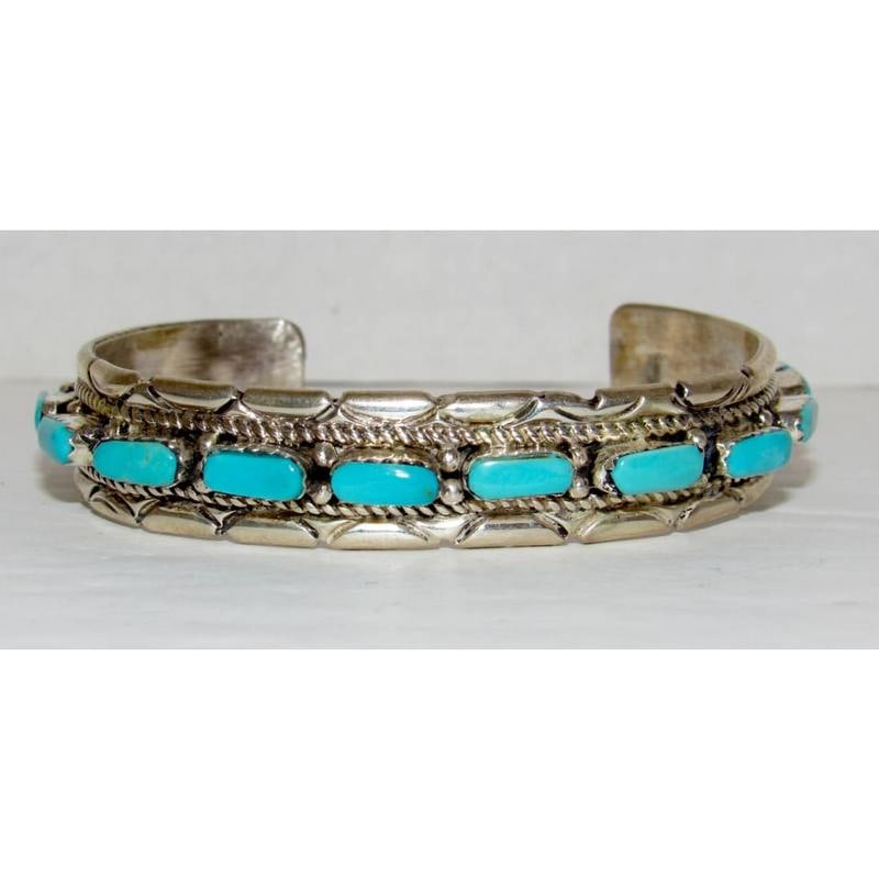 Zuni Sleeping Beauty Turquoise Cuff Bracelet Sterling Silver Stacker J Waseta: Zuni Sleeping Beauty Turquoise Cuff Bracelet Sterling Silver Stacker J Waseta. Stunning traditional vintage Native American Zuni hand etched cuff bracelet with a row of petit point Sleeping Beauty Min