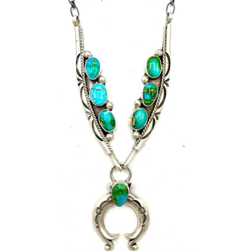 Navajo Royston Turquoise Naja Necklace Squash Blossom Sterling Silver T Lewis: Navajo Royston Turquoise Naja Necklace Squash Blossom Sterling Silver T Lewis. Stunning elegantl Navajo sterling silver squash blossom necklace by T. Lewis, featuring seven Royston turquoise stones in