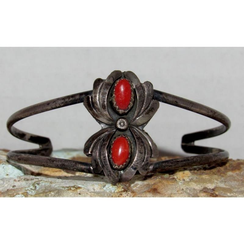 Old Pawn Navajo Coral Squash Blossom Cuff Bracelet Sterling Silver: Vintage Navajo sterling silver coral cuff bracelet featuring a classic squash blossom design. This handcrafted Native American cuff showcases a rich red coral cabochon set in sterling silver, with tra