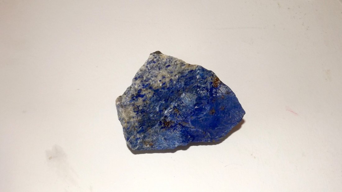 Unpolished Raw Lapis Lazuli Mineral Specimen: For your consideration is this stunning larger unpolished raw lapis lazuli mineral specimen with pyrite matrix. Beautiful deep color. Measures 3 1/2" long by 3" wide. NO BUYER PREMIUM. EASY IN HOUSE S