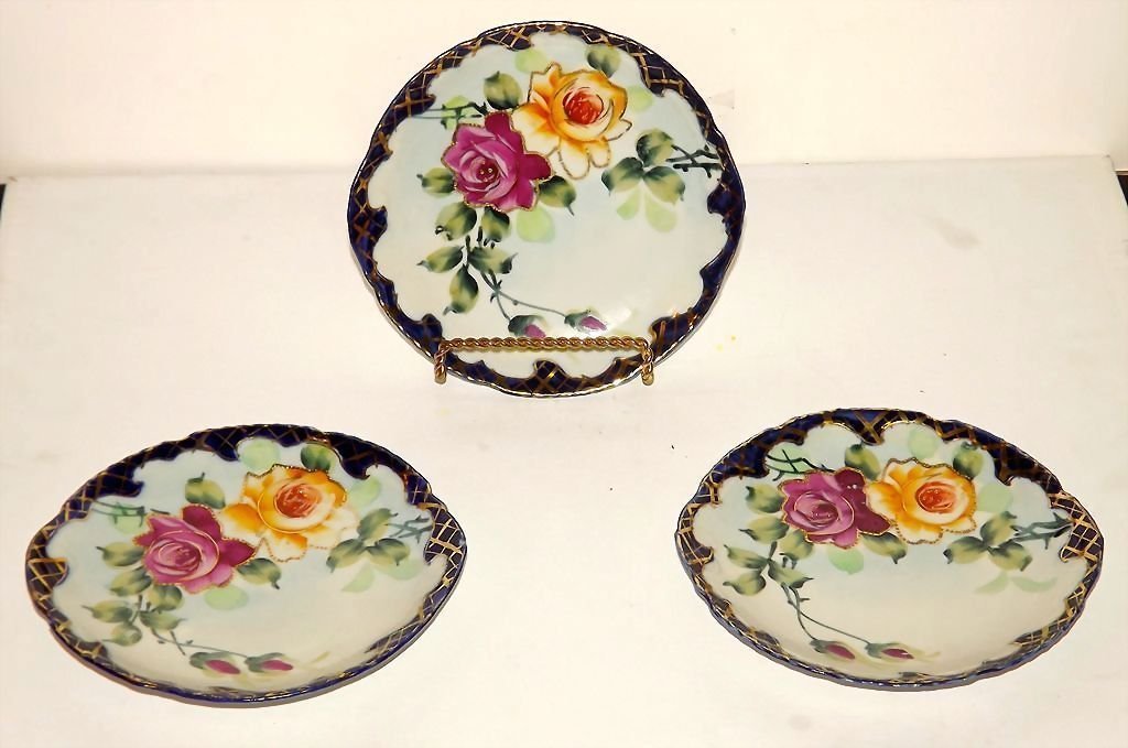Nippon Cobalt Blue Moriage Hand Painted Plates: For your consideration is a set of 3 gorgeous signed Nippon plates in wonderful condition. These beauties offer a stunning cobalt blue moriage design accented with colorful flowers. The pieces display
