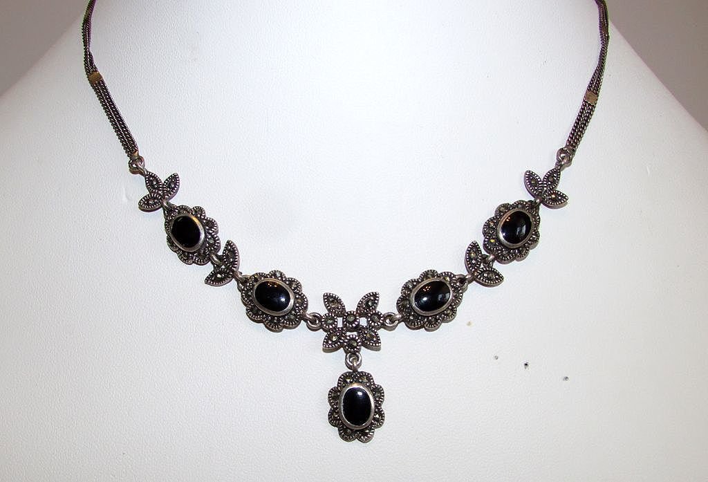 Vintage Sterling Marcasites Onyx Necklace: For your consideration is this exquisite vintage sterling silver, marcasite and black onyx necklace in wonderful vintage condition. This elegant piece features a drop necklace design in sterling silve