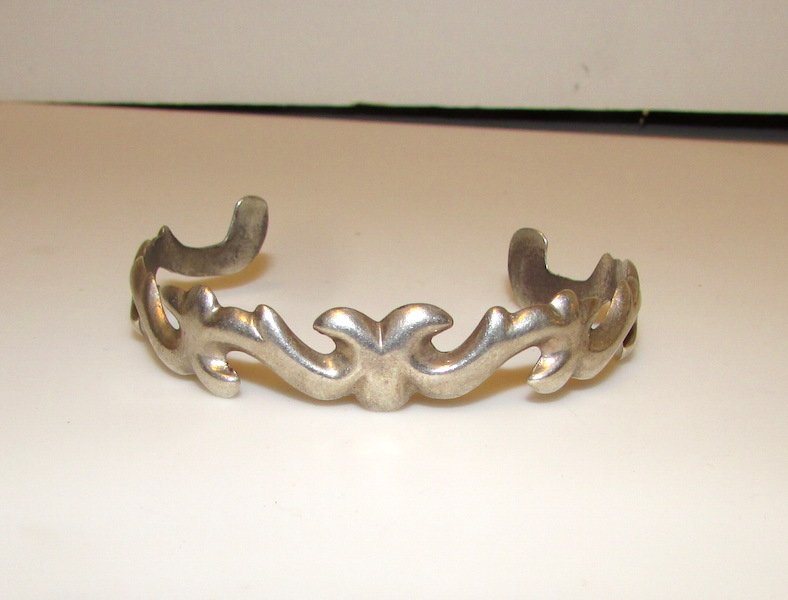 Old Pawn Native American Sand Cast Cuff: Fabulous Old Pawn Native American sand cast bracelet in wonderful vintage condition. Adjustable. Marked \"sterling\"