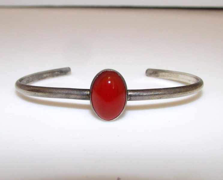Vintage Sterling Silver 925 Carnelian Small Bracelet: For your consideration is this wonderful vintage sterling silver and carnelian cuff bracelet for a smaller wrist. The cuff features a classic design in sterling silver accented with a bright carnelian