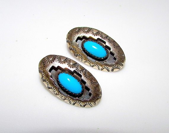 Navajo Sterling Silver Turquoise Shadow Box Earrings: Wonderful vintage Native American Navajo sterling silver and Sleeping Beauty mine earrings in nice condition. The earrings feature a shadow box design in sterling silver accented with intricately hand