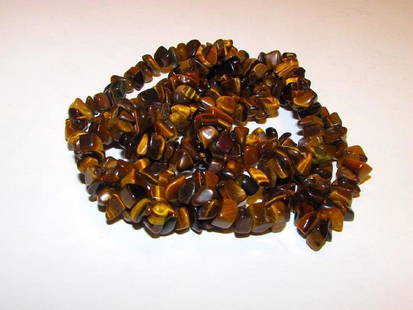 Vintage Genuine Tiger Eye Nugget Necklace: For your consideration is this wonderful vintage tiger eye nugget beaded necklace in wonderful vintage condition. This vibrant piece features a classic single strand design of carefully selected tiger