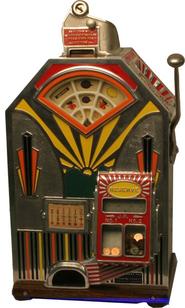 Jennings Little Duke Slot Machine.: Three reel oak cased with cast aluminum front. Size: 25 1/2" tall. Cond: Professionally restored and in good working order.