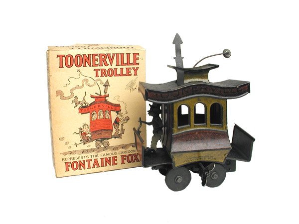 Toonerville Trolley and Box.: Tin litho w/up from Fontaine Fox cartoon strip. Box is from Dent Hardware Co. Size: 6" long. Cond: Very good and working.