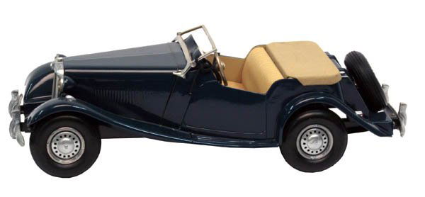 Model Doepke M.G. Automobile.: 1950's P.S. with rubber tires. Size: 15" long. Cond.: Restored.