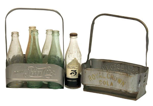 Lot of 2 Six-Pack Carriers.: One Pepsi Cola and one Royal Crown. Variety of bottles including Dr. Pepper, Pepsi and Coca Cola. Size: Varies. Cond.: Pepsi Cola has been repainted, Royal Crown has surface rust, bottles are very goo