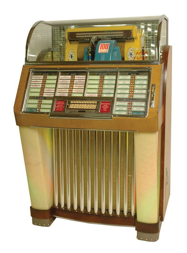 Seeburg Jukebox.: Model "C" select-o-matic art deco style jukebox operating on 45 rpm records. Size: 34" x 54". Cond.: Very good to excellent and in good working order.
