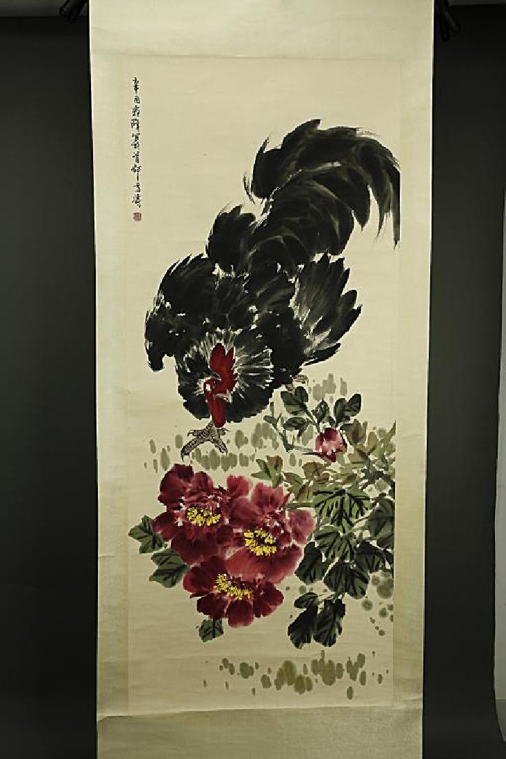 CHINESE SCROLL PAINTING OF A ROOSTER AND PEONIES: Signature to read XUETAO (1903-1982), seal mark to read WANG XUE TAO YIN, dated XIN YOU (1981). H: 53 3/4 in. x W: 22 3/8 in.