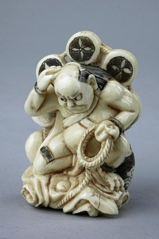 ANTIQUE CHINESE CARVED IVORY NETSUKE: From the Private collection of Mr. Paul Siegal. Figure of a celestial being. H: 2 1/4 in.(5.5cm)