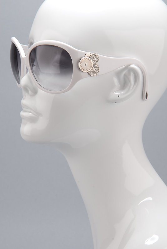 Bvlgari White Round Oversize Sunglasses: Designer: Bvlgari Style / Model: 8023-B Frame Color: White Lens Color: Smoke Oversize lenses Curved arms Movable signature embellishment Crystal trim Signature pla