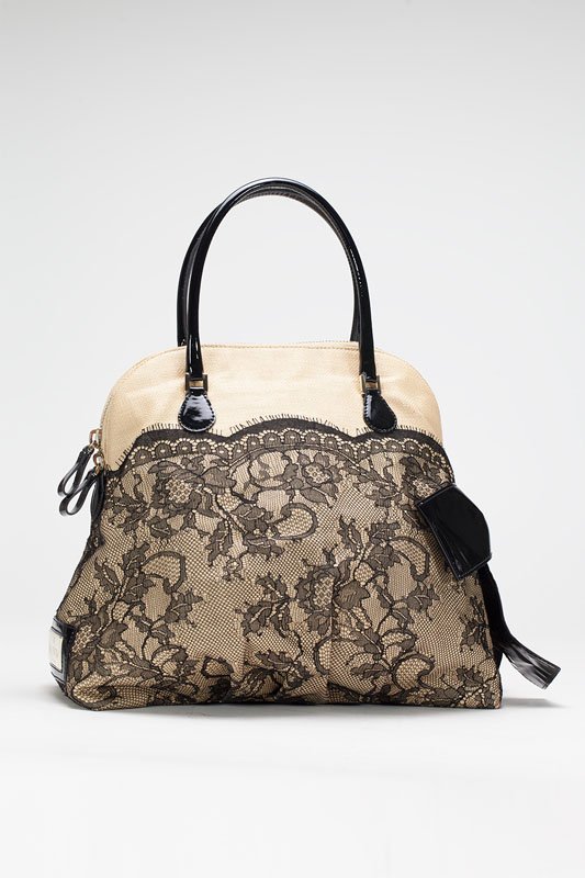 Valentino Tan & Black Straw & Lace Dome Bag: Designer: Valentino Style: Handbag, Everyday Bag Color: Tan, Black Weaved body Fine lace overlay Top zip closure Dual patent leather handles Gold tone hardware Interior cell phone