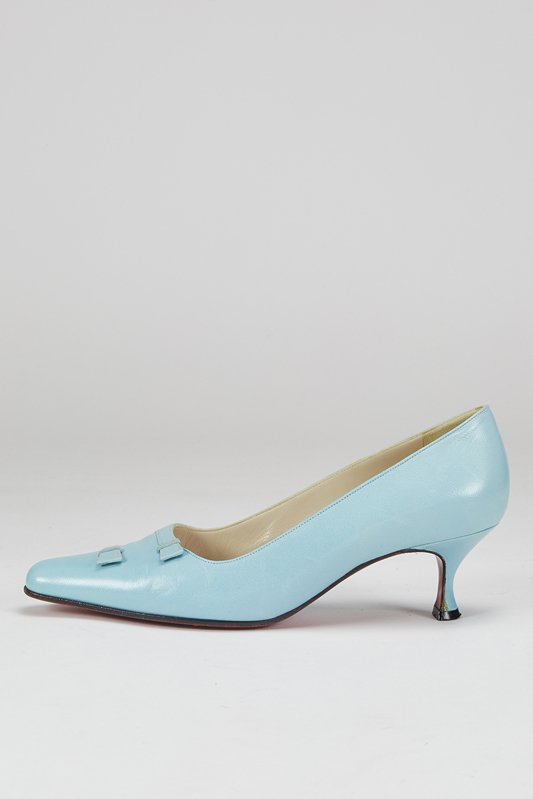 Christian Louboutin Blue Leather Pumps (5/35): Designer: Christian Louboutin Color: Blue Signature Red Leather Sole Leather body Accent straps on front Kitten heel Insole: 10" / Heel: 2" Size: 5 USA / 35 IT Width: B Condition: Pre-owned Upper exte