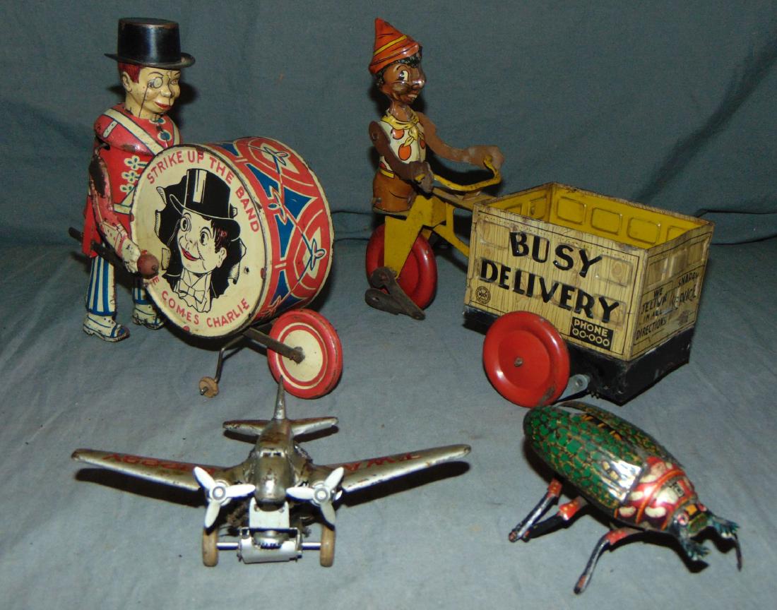 Four Piece Tin Toy Lot. (1 of 2)