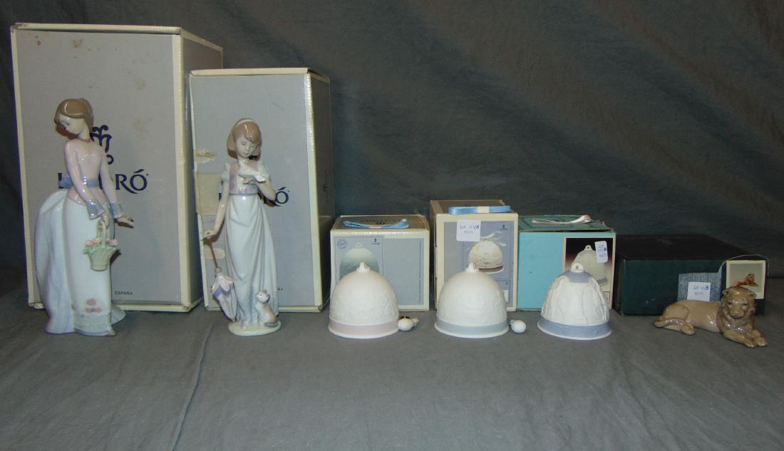 Porcelain Lladros. Lot of 6.: includes 07622 - Basket of Love, 97611- Summer Stroll, 17616 - Winter Bell, 7613 - Spring /bell, 5641 - 1990 Bell and 5436 -Leon en Descanso. Each in original box. Wear noted to boxes - nice overall c