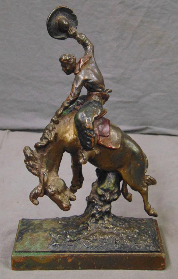 Paul Herzel (1876 - 1956) Bronze Cowboy.: Bucking Bronco. 11" tall with base. signed.