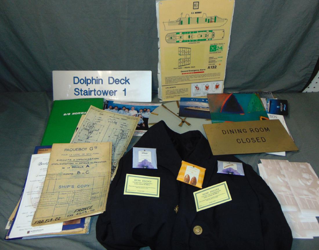 SS Norway/France Box Lot of Collectibles: Includes ship signs, jacket, brochures, blue prints, clock, and more. Examine.