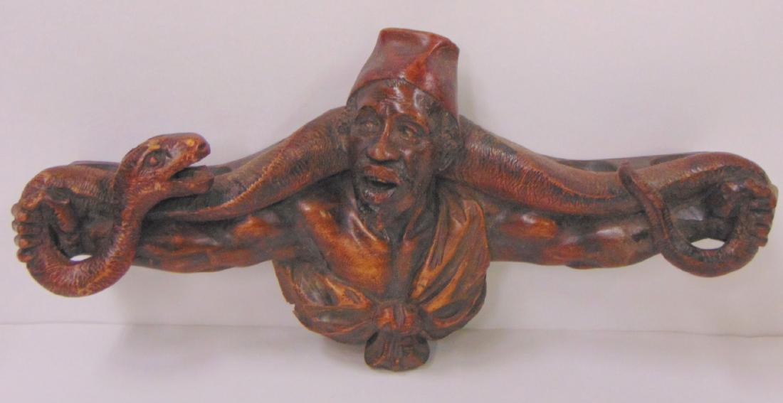 Wood Carved African Motif Pipe Holder. (1 of 4)