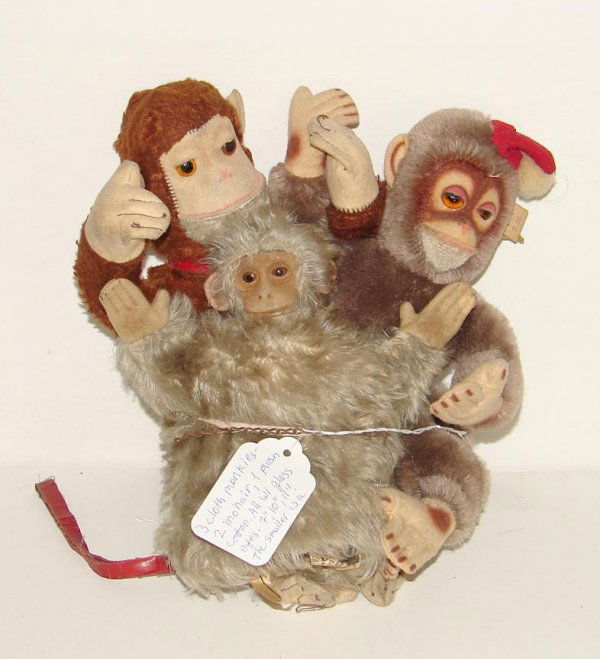 LOT OF THREE CLOTH MONKEYS: 7", 10", & 11", TWO MOHAIR, AND ONE COTTON PLUSH, ALL GLASS EYES. THE SMALLER ONE IS A HAND PUPPET (MAYBE SCHUCOS). THE 10" ONE IS WITH LABEL MARKED CHARACTER, NORWALK CONNECTICUT.