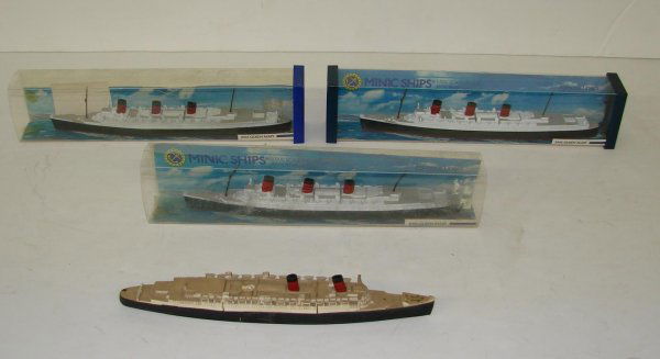 LOT OF QUEEN MARY MINIC SHIP MODELS: NICE LOT OF 4 QUEEN MARY MINI SHIP MODELS BY HORNBY. 3 ARE STILL IN THE ORIGINAL BOX, AND ONE IS LOOSE. THE LOOSE MODEL SHOWS OVERALL WEAR AND HAS DAMAGE TO IT WITH BROKEN PIECES. MODELS ARE 1:1200 SC