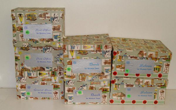 LOT OF 6 BOXED WESTERN TOWN PLAYSETS SHG: NICE LOT OF 6 BOXED WESTERN TOWN PLAYSETS. MADE IN GERMANY. GREAT FOR TRAIN LAYOUTS OR TOY SOLDIER LAYOUTS. INCLUDES GENERAL STORE, (2) SALOON, (2) BANKS, AND POST OFFICE. ALL PIECES SHOW SOME EDGE AN