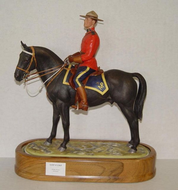 1966 DORIS LINDNER ROYAL CANADIAN POLICEMAN: ORIGINAL ROYAL WORCESTER FIGURINE TITLED "ROYAL CANADIAN MOUNTED POLICEMAN", 1966, MODELLED BY DORIS LINDER. EDITION OF 500. MARKED NO. 2117, AND THERE IS PAPER LABEL WITH "4". COMPLETE WITH WOOD PLIN