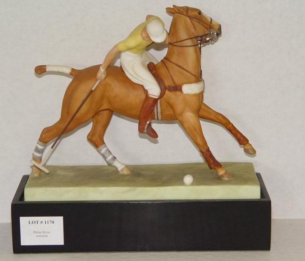 1936 DORIS LINDNER THE POLO PLAYER FIGURINE: ORIGINAL ROYAL WORCESTER FIGURINE TITLED "THE POLO PLAYER", 1936. MODELLED BY DORIS LINDER. UNLIMITED EDITION. MARKED 3163, 1465C, AND RN816906. COMPLETE WITH WOOD PLINTH BASE. STANDS APPROX. 8-1/4" H