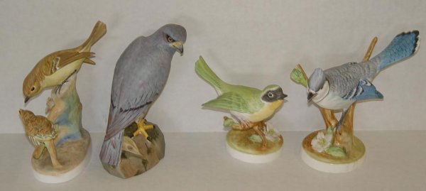 LOT OF 4 PORCELAIN BIRD FIGURINES: INCLUDES "FLYCATCHER AND YOUNG" BY STAFFORDSHIRE, MODELLED BY DORIS LINDNER AND W.R. TIPTON MARKED 75, "MALE MONTAGU HARRIER" BY SPODE, "YELLOW THROAT WARBLER" BY STAFFORDSHIRE MARKED 72, AND "BLUE JA