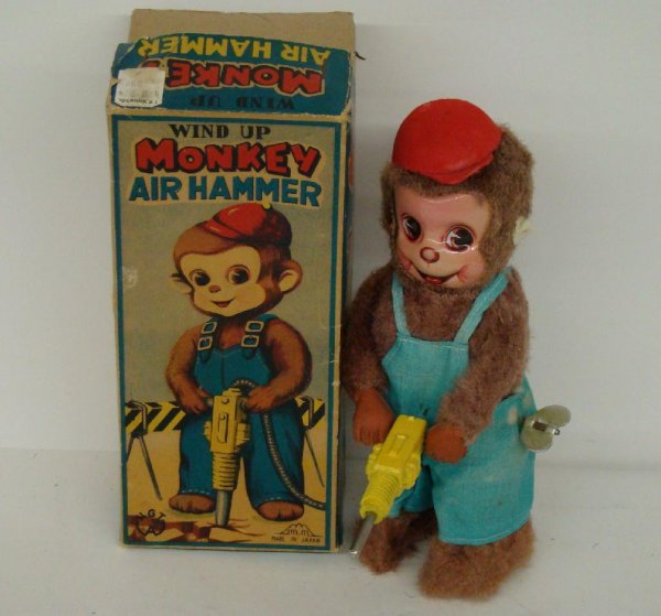 WIND UP MONKEY AIR HAMMER. BOXED.: N.G.T.. JAPAN. IN ORIGINAL BOX .