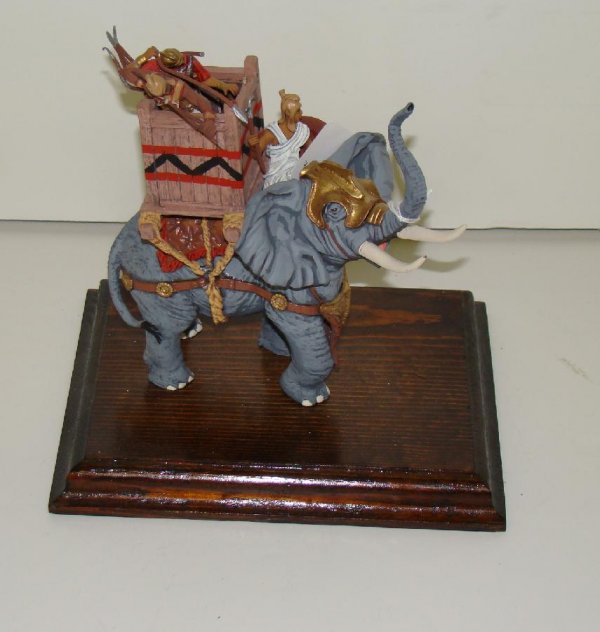ELEPHANT WITH 2 ROMANS MOUNTED.