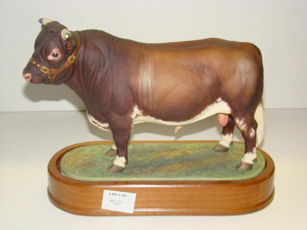 1965 DORIS LINDNER. DAIRLY SHORTHORN BULL: ORIGINAL ROYAL WORCESTER FIGURINE TITLED "DAIRLY SHORTHORN BULL", 1965, MODELLED BY DORIS LINDER. EDITION OF 500. MARKED "0615D". COMPLETE WITH WOOD PLINTH BASE. APPEARS TO BE IN FINE CONDITION. SOLD