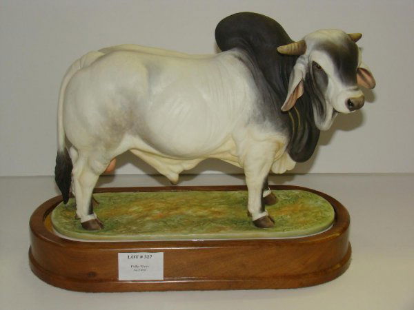 1968 DORIS LINDNER. BRAHMAN BULL: ORIGINAL ROYAL WORCESTER FIGURINE TITLED "BRAHMAN BULL", 1968, MODELLED BY DORIS LINDER. EDITION OF 500. COMPLETE WITH WOOD PLINTH BASE. APPEARS TO BE IN FINE CONDITION. SOLD AS IS.