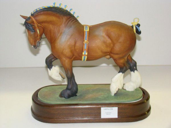 1964 DORIS LINDNER. SHIRE STALLION: ORIGINAL ROYAL WORCESTER FIGURINE TITLED "SHIRE STALLION", 1964, MODELLED BY DORIS LINDER. EDITION OF 500. MARKED "MP". COMPLETE WITH WOOD PLINTH BASE. THERE ARE 4 BROKEN TIPS ALONG THE TOP OF THE HEA