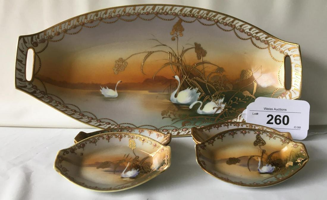 Nippon Serving Dish and Plates.: Hand Painted Nippon. 12 1/2" long serving dish and (6) 4" long dishes.