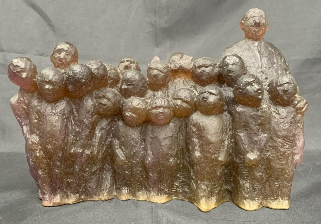 Daum France, Pate De Verre Sculpture: Daum France amber art glass Pate de Verre sculpture. Depicts a male figure with 19 children. Signed on the verso Daum France, and numbered on the bottom 52/100. Approx. 13-1/2" long x 9-1/2" tall.