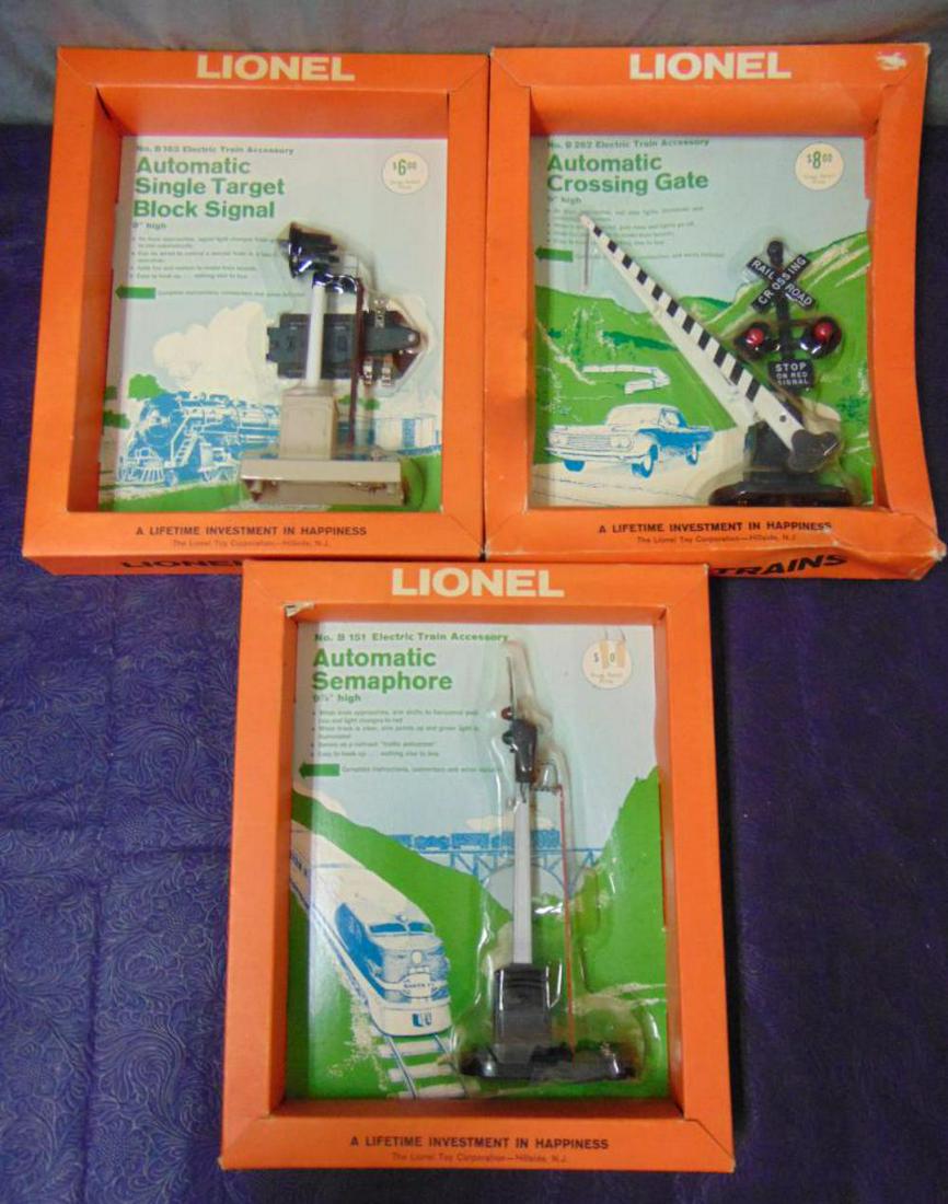 3 Boxed Lionel Blister Accessories: Includes a B163 Target Signal, sealed in nice frame box; B151 Semaphore, sealed on card, but bubble is cracked with nice frame box; B262 Auto Crossing, sealed on nice card with worn frame box. From Th