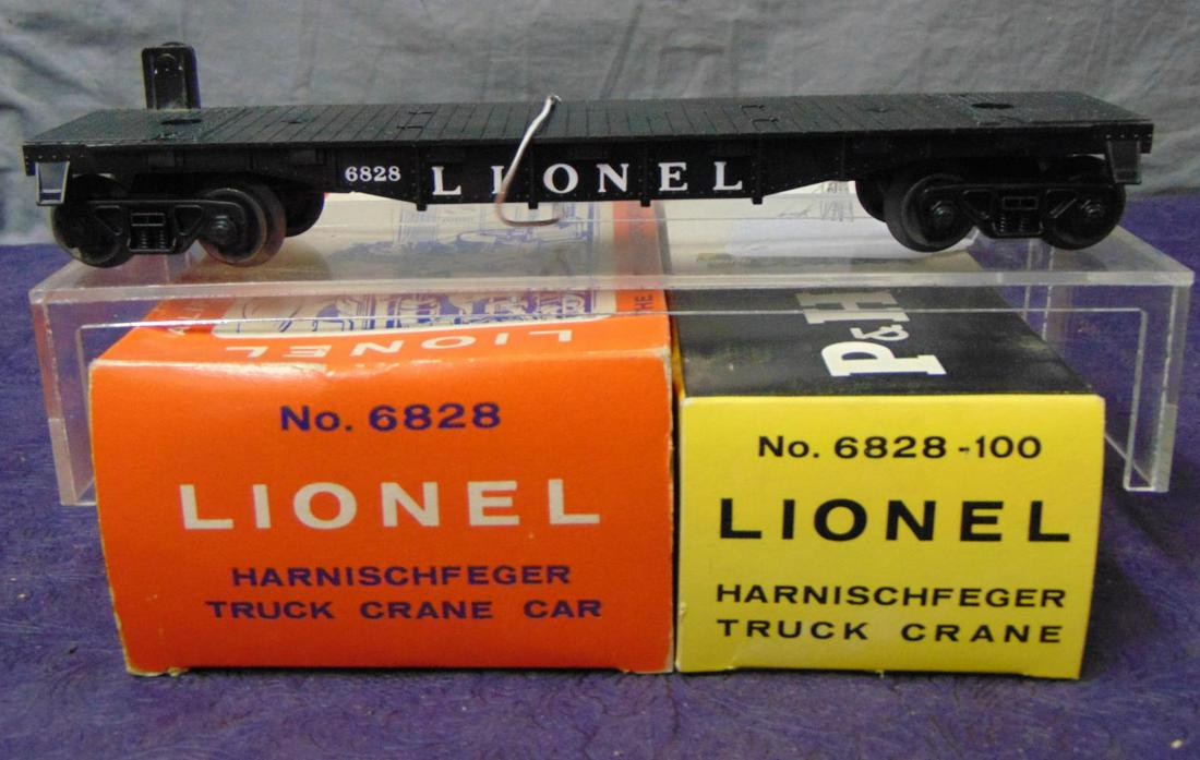 Boxed Lionel 6828 Flat With P&H Crane: Nice example, clean and all plastic parts are intact. It is missing the wires. It has its cotton wrap, inner box with UNRUN flat with band and a nice picture box. Nice example!