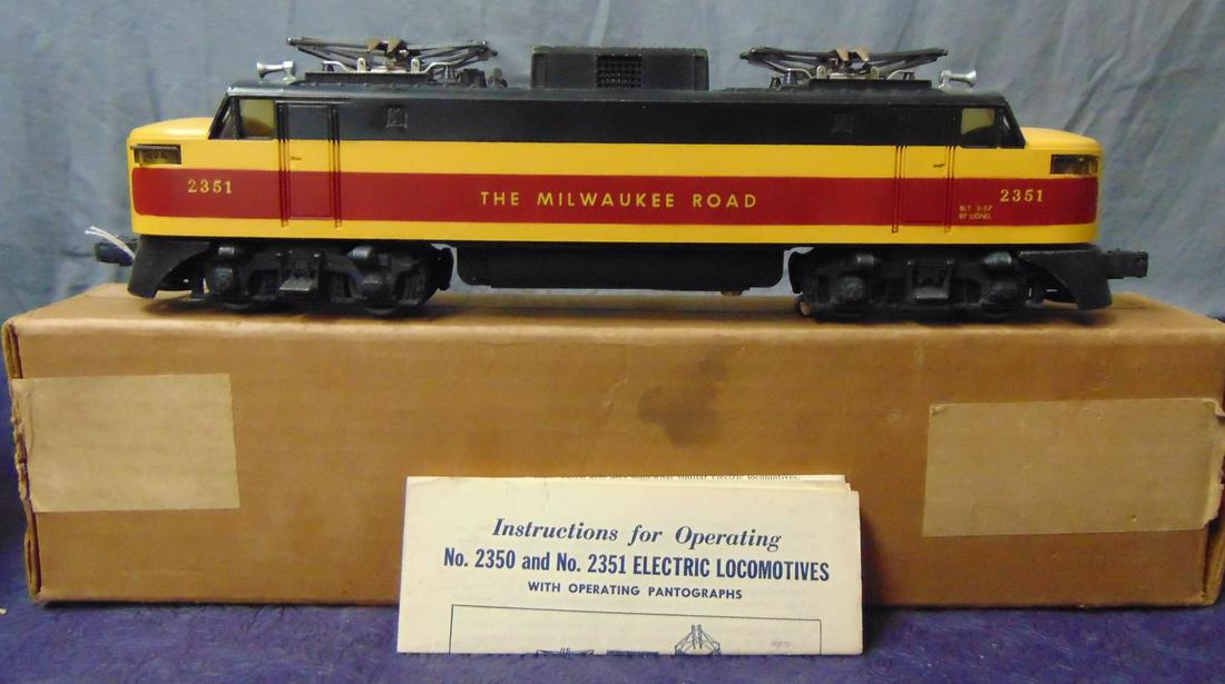 Nice Boxed Lionel 2351 MR EP5 Electric: Clean example with bright graphics. It has a partial closed hairline nose crack one side, but has a clean battery box and includes it’s instructions. It shows light runtime with nice box. From The E