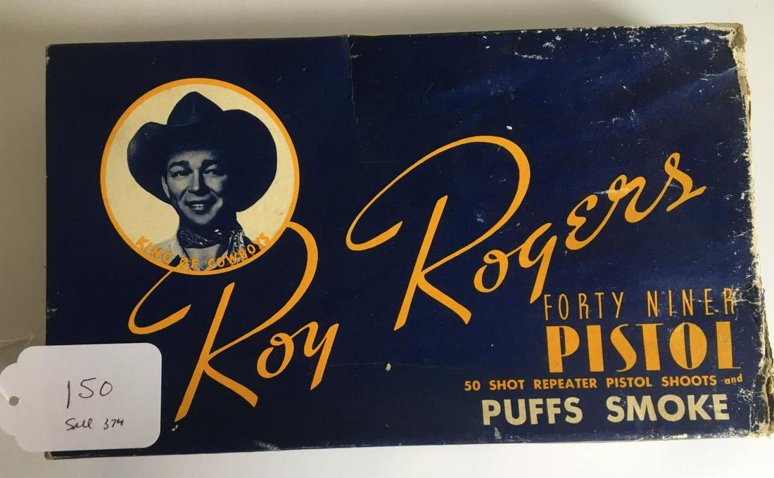 Roy Rogers. Cap Pistol Boxed.: Scarce Leslie Henry Forty Niner Pistol 50 Shot Repeater Pistol shoots and Puffs Smoke. Original Box show wear, Gun is Excellent.